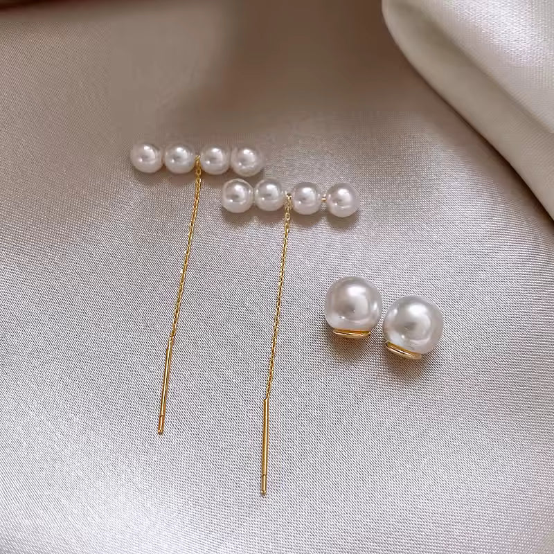Moderne Perlen-Ohrstangen mit Kettenanhänger – eleganter Ohrschmuck in Gold Ohrringe Das Zierwerk