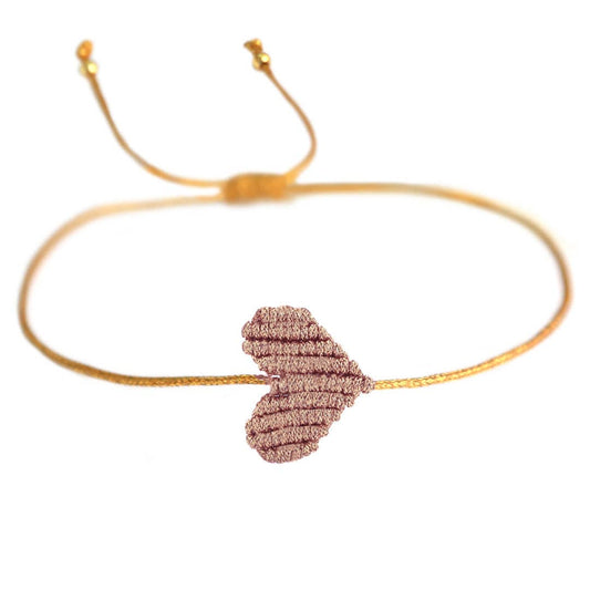 Feines Armband mit Champagner-Herz – handgeknüpft & verstellbar