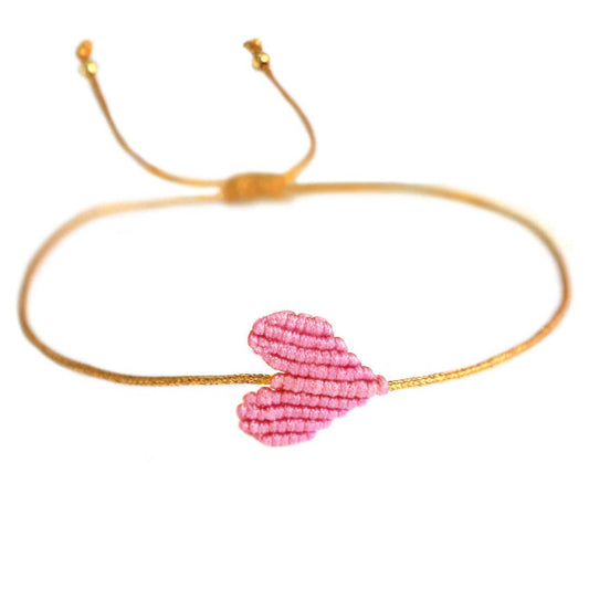 Feines Armband mit hellrosa Herz – handgeknüpft & verstellbar