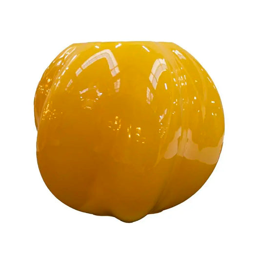 Gelbe Glasvase in organischer Form