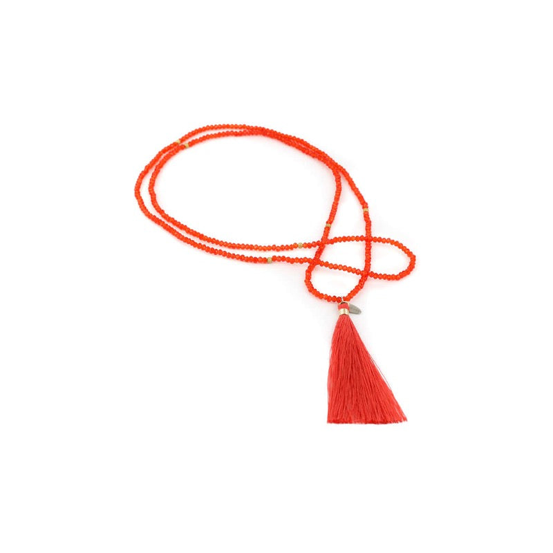 Quastenarmband „Stretch“ – Korall trifft Kristallglanz