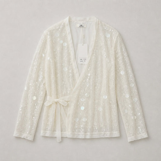 Wickeljacke mit Pailletten – Glamour in Cremeweiß Strickjacke Das Zierwerk