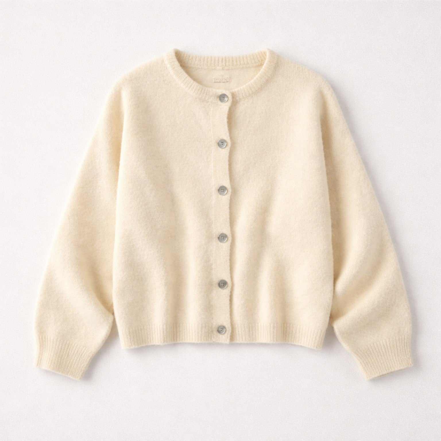 Strickcardigan in Cream – zeitlose Eleganz in ihrer weichsten Form Strickjacke Das Zierwerk