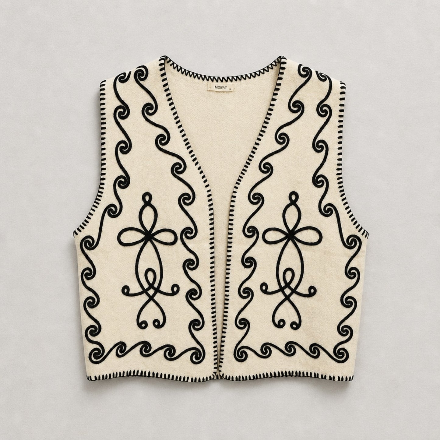 Strickweste mit Stickerei – Creme & Schwarz Weste Das Zierwerk