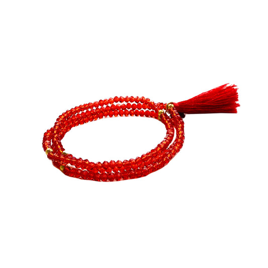 Quastenarmband „Stretch“ – Funkelnder Akzent in Rot